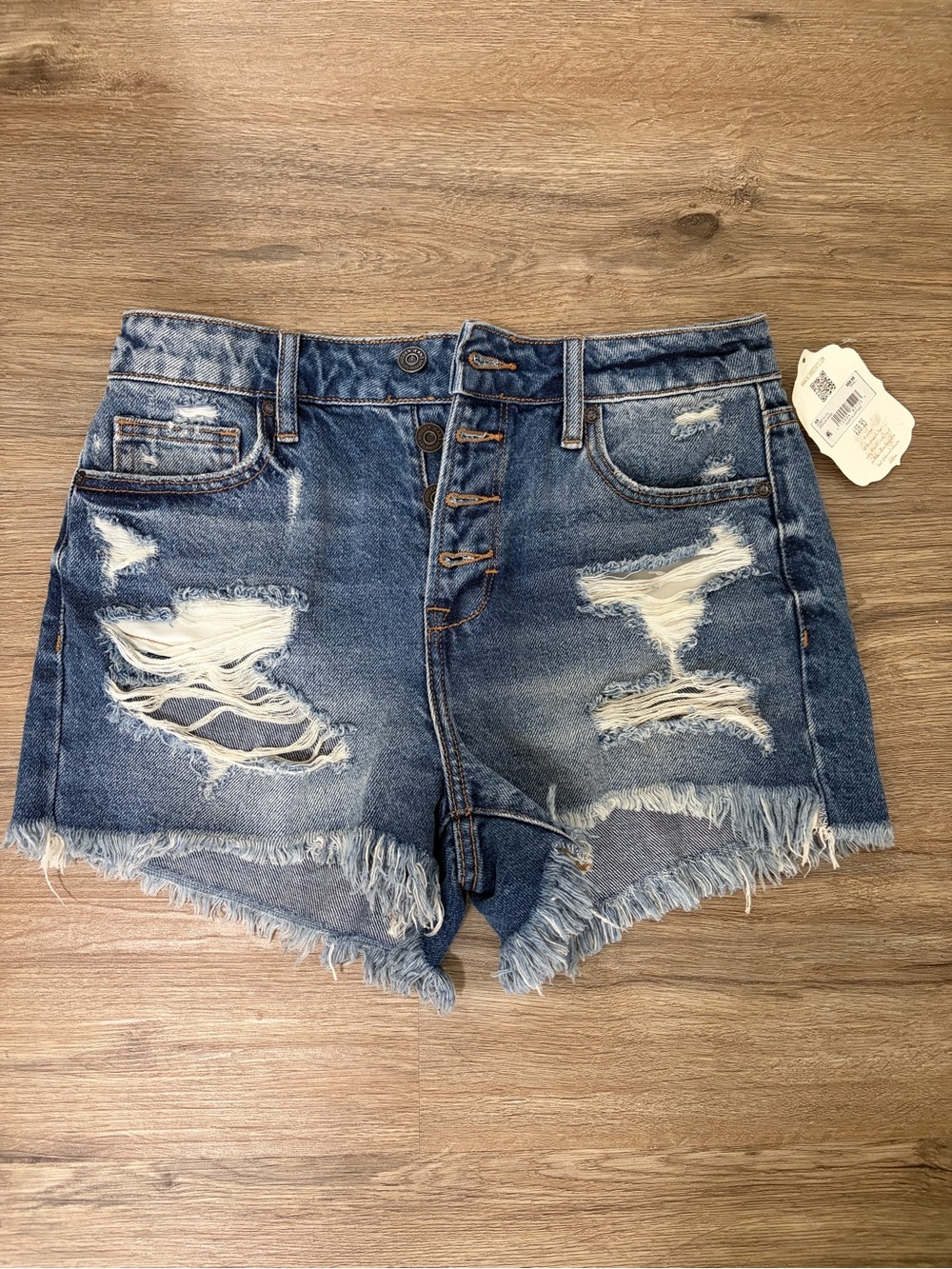 Altar'd State Distressed Dark Blue Denim Shorts with Frayed Hem